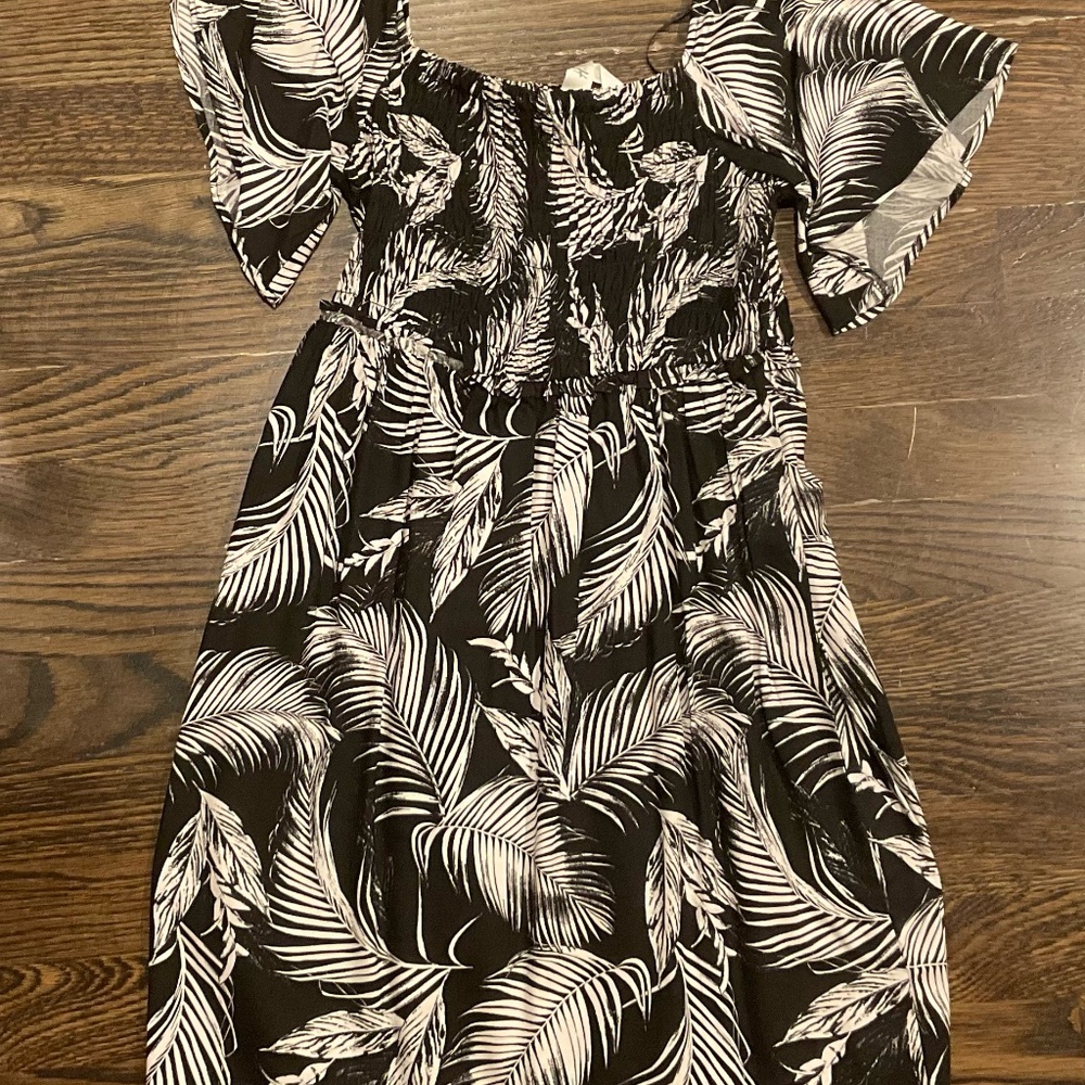 black beach dress with leafs